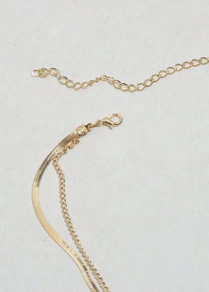 The Lumière Cross Necklace